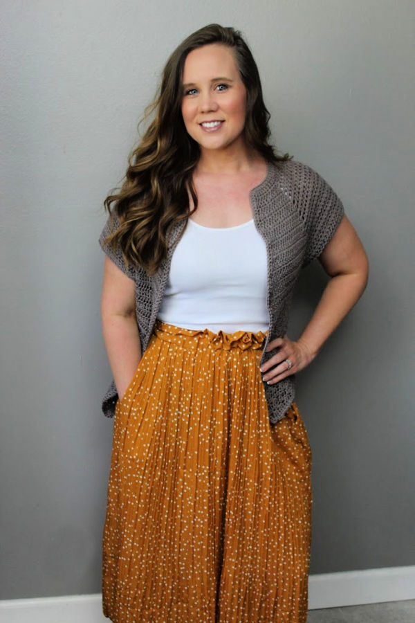 Woman wearing taupe Grace Cardi with white tank top and yellow maxi skirt. 