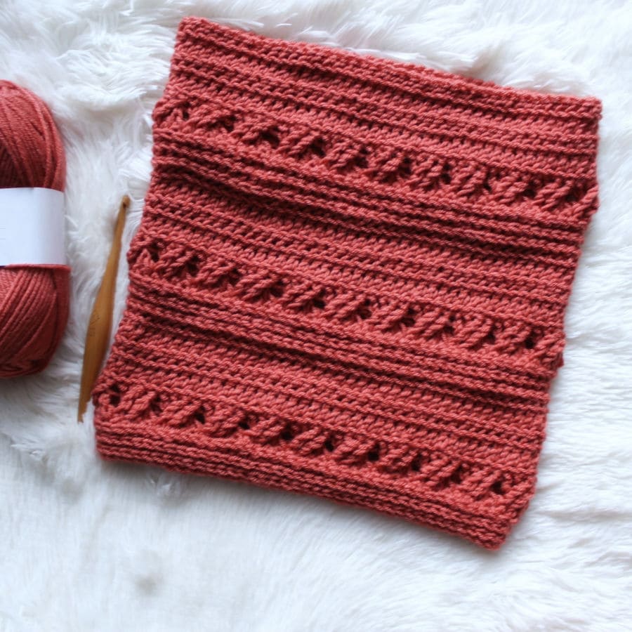 Flat lay of crochet cowl pattern, called the Catherine Cowl. 