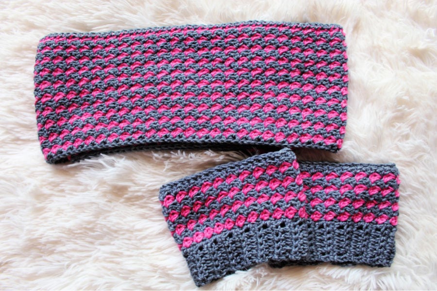 Flat Lay of Pink and Gray crochet scarf and boot cuffs set. 