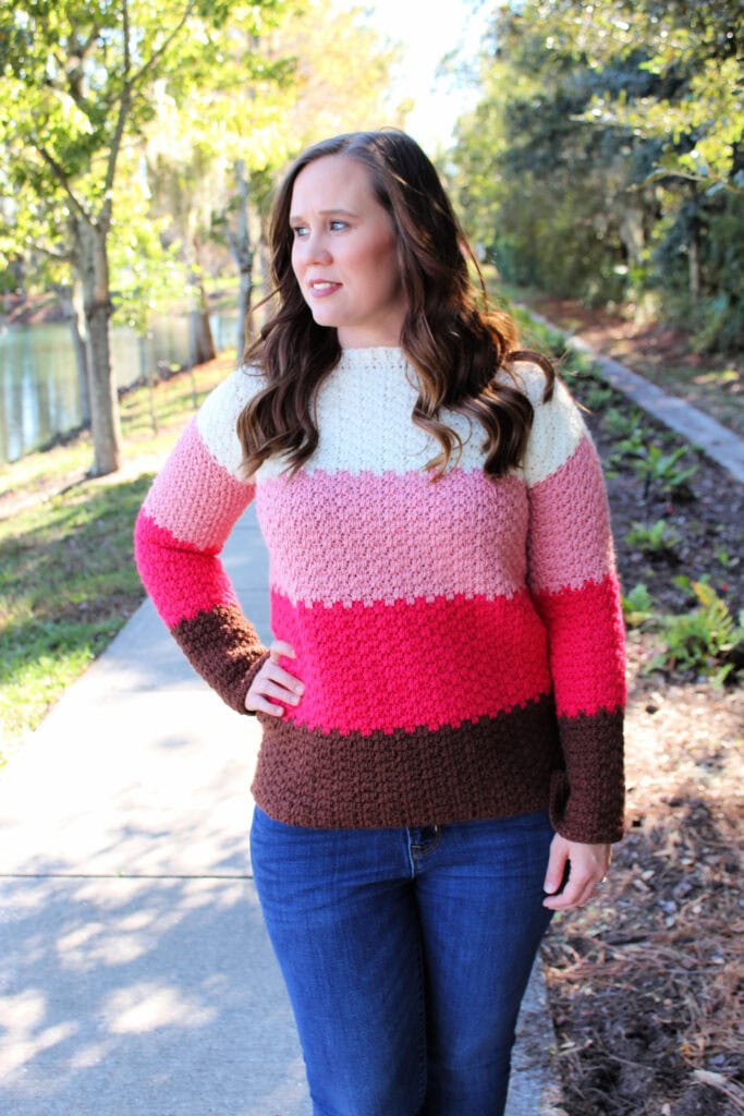 Woman wearing color block crochet sweater called the Michelle Sweater. 