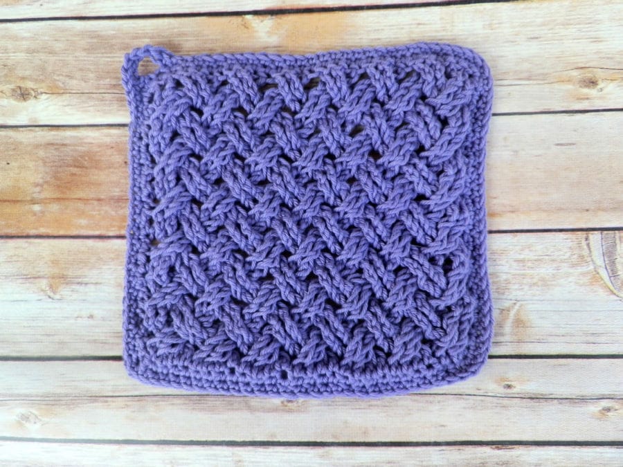 Photo of the hot pad in the crochet kitchen set, called the Celtic Weave Kitchen Set. 