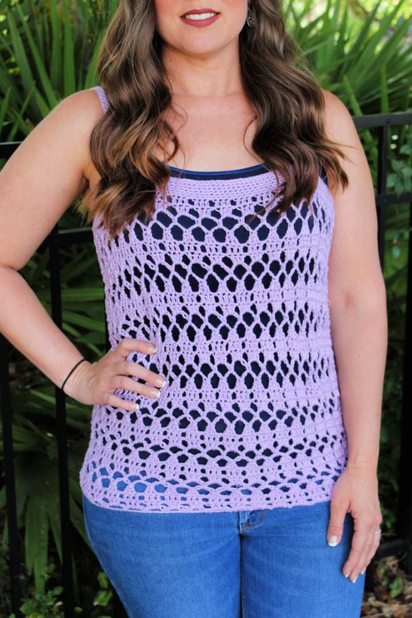 Close up view of woman wearing a light purple crochet tank top, called the Sarasota Tank. 