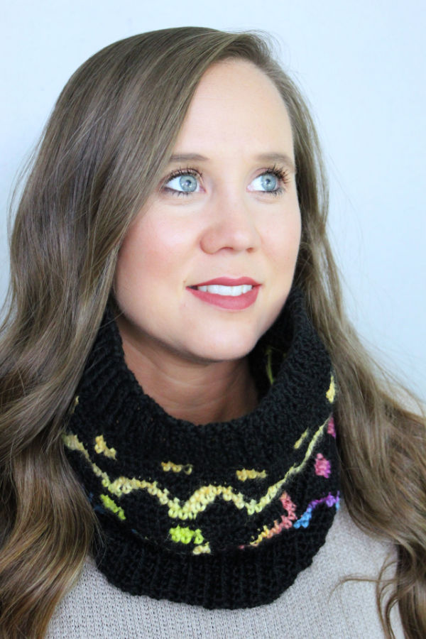Woman wearing a crochet cowl called the Camden Cowl.