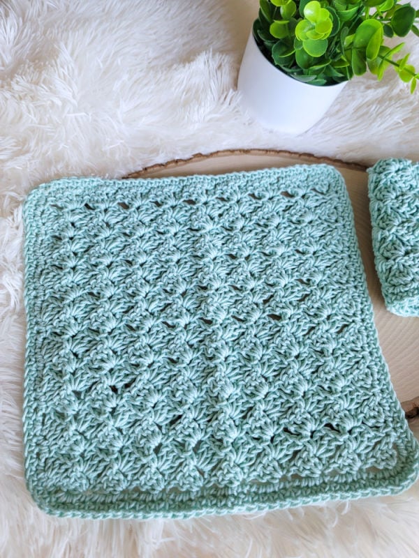 Mint green crochet washcloth, called the Dallas Washcloth.