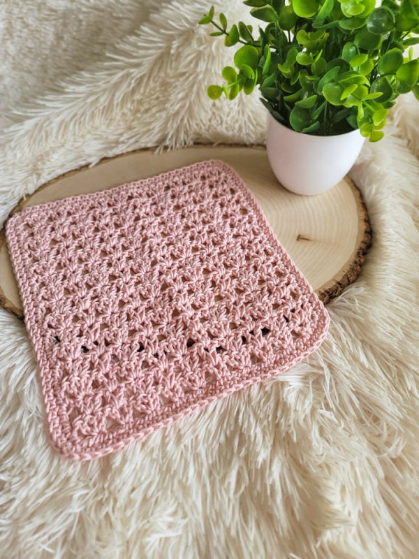 Pink crochet washcloth, called the Katie Washcloth.