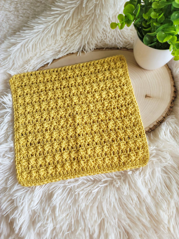 Yellow crochet dishcloth, called the Tuscan Sun dishcloth. 