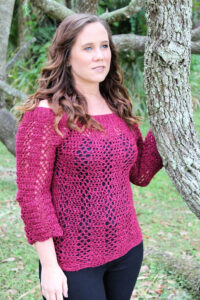 Off-the- shoulder crochet sweater pattern, called the Sabre Sweater.