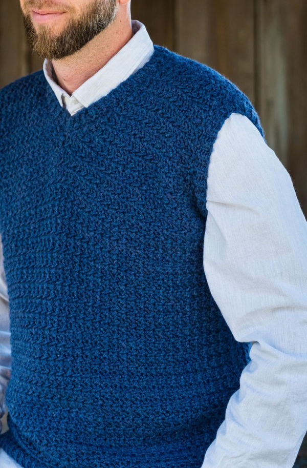 Close up of men's crochet sweater vest, called the Sylas Sweater Vest.